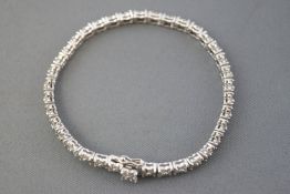 A white metal fancy line bracelet.