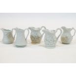A group of five Portmeirion white biscuit relief-moulded jugs, 20th century moulded marks,