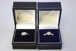 A collection of two 9ct gold (Stamped/hallmarked) diamond set dress rings. Sizes K & N.