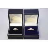 A collection of two 9ct gold (Stamped/hallmarked) diamond set dress rings. Sizes K & N.