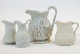 Three Portmeirion white biscuit relief-moulded jugs, and another, 20th century, printed marks,