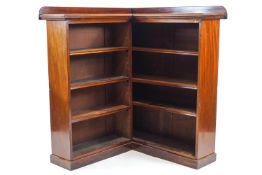 A Victorian mahogany corner bookcase, the 'L' shaped case with six adjustable shelves in two sizes,