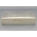 A silver cigarette box, of strict plain rectangular form,