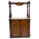 A Victorian walnut marquetry what-not cupboard, the brass gallery on four turned baluster supports,