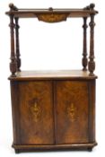 A Victorian walnut marquetry what-not cupboard, the brass gallery on four turned baluster supports,