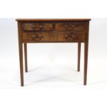 A mahogany side table with two short above one long drawer, on square legs,