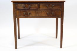 A mahogany side table with two short above one long drawer, on square legs,