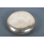 A silver pinch action tobacco/snuff box, of plain round form, Chester 1898, 8cm wide,