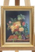 B Fitz, A Still Life of fruits and figures in a footed bowl, signed lower right, oil on board,