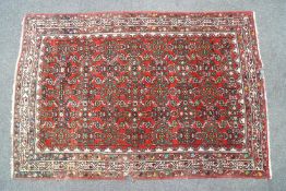 A handmade Persian Mashad carpet, circa 1930-1940,