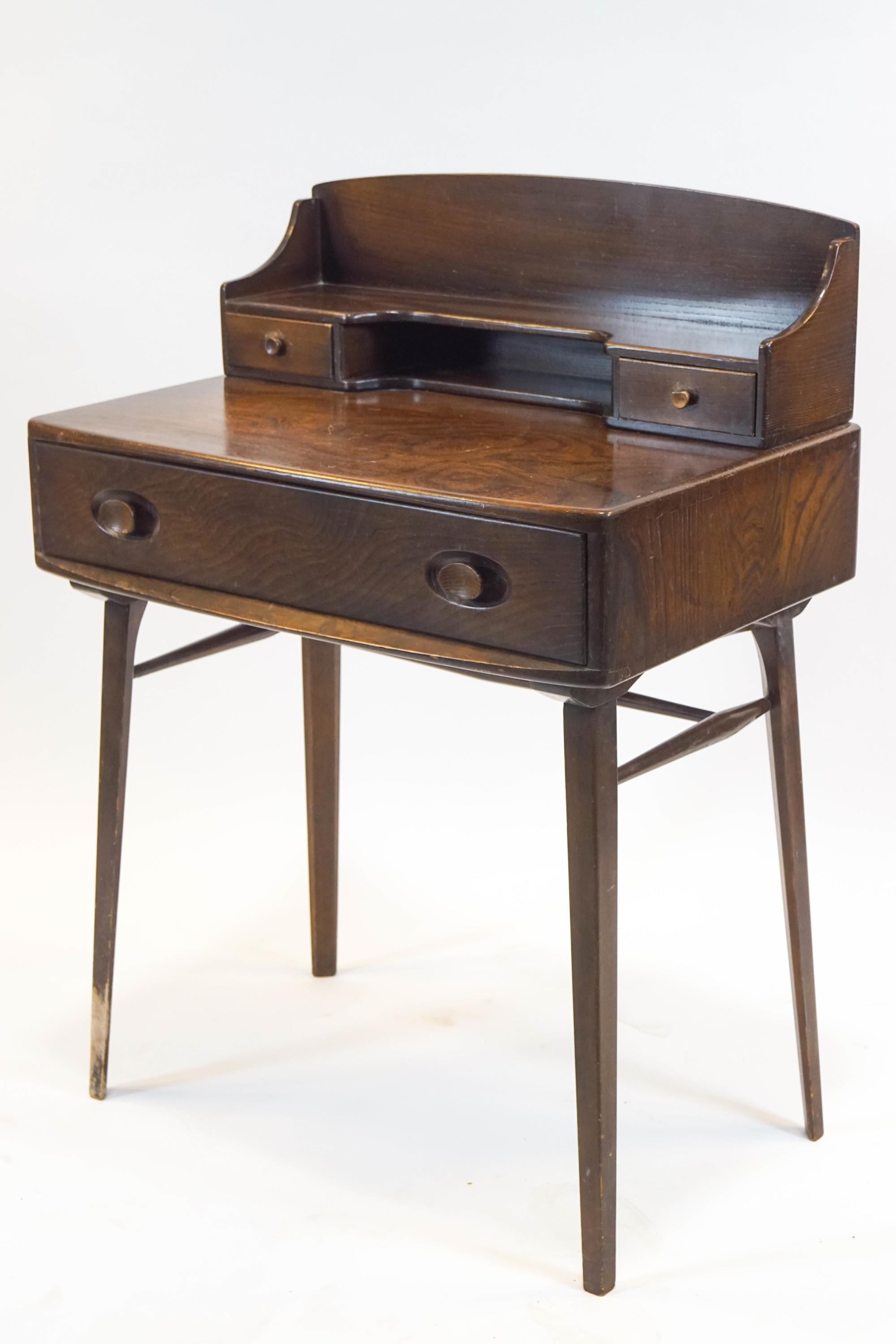 An Ercol elm desk the raised back with two drawers above one long drawer, on square tapering legs, - Image 2 of 3