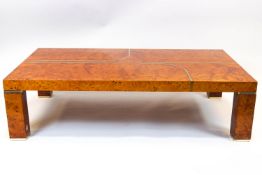 A 20th century lacquered walnut coffee table, inlaid with brass ribbons in Art Deco style,