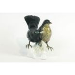 A Rosenthal model of two blackbirds, 20th century, printed green marks, incised and impressed marks,