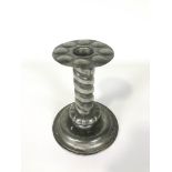 A Norwegian (NEA TINN) arts and crafts pewter candlestick, the spiral stem missing a broad nozzle