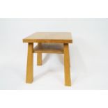A 21st century elm two tier occasional table on flared square legs,