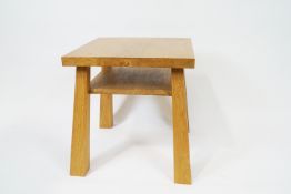 A 21st century elm two tier occasional table on flared square legs,