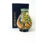 A Moorcroft pottery baluster vase decorated with the Trout pattern, impressed factory marks,