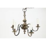 A continental white metal chandelier,the baluster graduated stem issuing four S shaped branch,