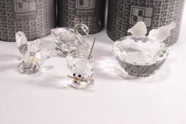 Three Swarovski glass figures, of a butterfly, 5cm high, a mouse 4cm high, and a swan 5cm high,