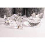 Three Swarovski glass figures, of a butterfly, 5cm high, a mouse 4cm high, and a swan 5cm high,