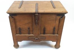 An Indian iron bound teak wood dowry chest, with hinged top above a frieze drawer,