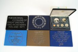 Six sets of boxed commemorative coins comprising: the 1974 coinage of the British Virgin Islands,