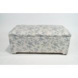 A pine upholstered ottoman, of rectangular section,