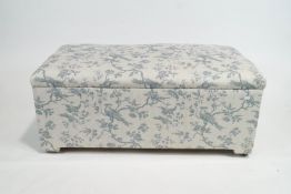 A pine upholstered ottoman, of rectangular section,