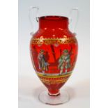 A Venetian style glass enamelled vase, oriform and of red tint, enamelled with 18th century style,