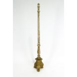 A giltwood and gesso column standard lamp base, in the style of a 19th century torchere on paw feet,