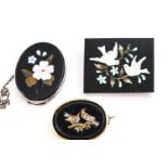 A collection of three pietra dura brooches of variable designs.