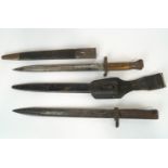 Two bayonets, one with leather scabbard, the blade stamped Mole 497,
