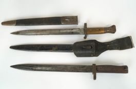 Two bayonets, one with leather scabbard, the blade stamped Mole 497,