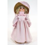 A German (William Goebel) bisque headed doll, with jointed composition body,