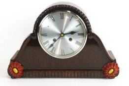 An eight day German (HAC) oak mantel clock, the chiming clock with Hermle floating balance movement,