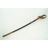 A gilt metal and steel German World War I state issue sword the handle pierced and cast