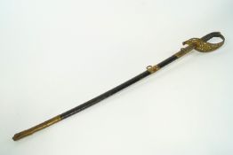 A gilt metal and steel German World War I state issue sword the handle pierced and cast