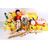 Four Pelham puppets, comprising : Tyrolean Girl, Fritzi, Baby Dragon and Cow Ermintrude, boxed,