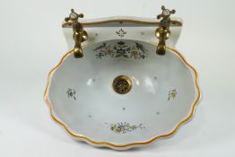 A French femence ( Maurice herbeau,lille) basin of fluted form, painted with blue,