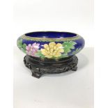 A modern Chinese cloisonne shallow bowl and carved ebanised stand ,