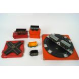 A collection of Hornby 0 gauge parts from a trainset, including a turntable,