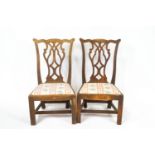 A pair of George III style oak child's chair with pierced interlaced splats,