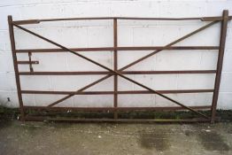 An iron six bar gate 115cm x 215cm