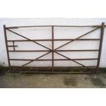 An iron six bar gate 115cm x 215cm