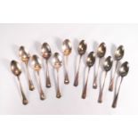 A cased set of six Hanoverian Rat Tail pattern silver teaspoons, Birmingham 1923,and another set,