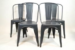 Four Xavier Pauchard model A metal chairs