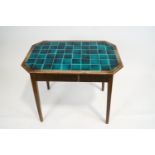 An oak kitchen table, of octagonal section,