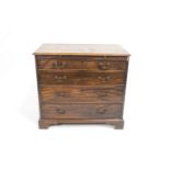 A Georgian mahogany chest of drawers with four graduated drawers on ogee bracket feet,