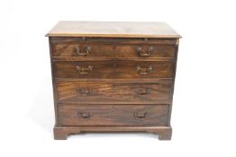 A Georgian mahogany chest of drawers with four graduated drawers on ogee bracket feet,