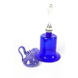 A Victorian blue glass bell with clear handle,